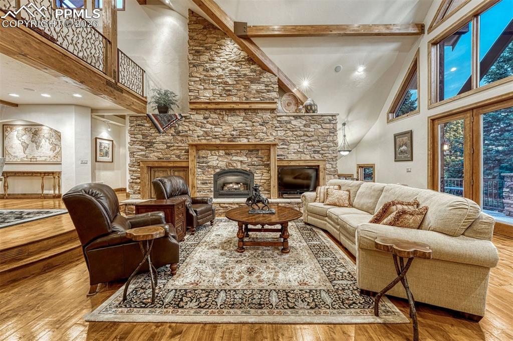 Image 48 of 50: Quintessential Colorado great room with soaring ceilings and warm timber ac