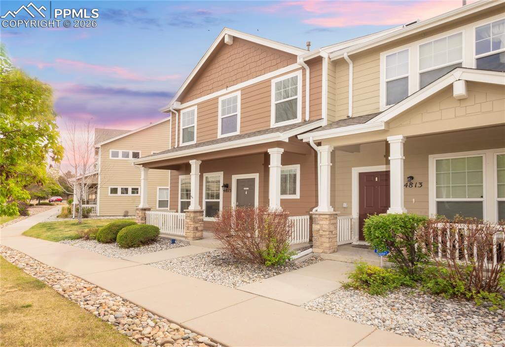 Image 3 of 33: Craftsman-style home with covered porch