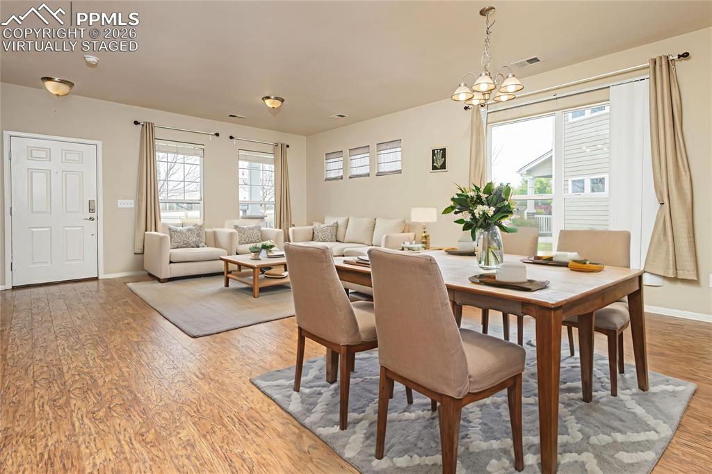 Image 5 of 33: Dining area featuring light wood-style flooring, plenty of natural light, a