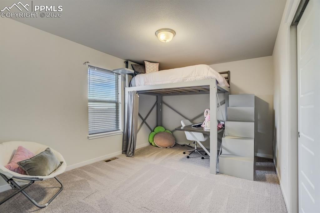 Image 24 of 39: Bedroom