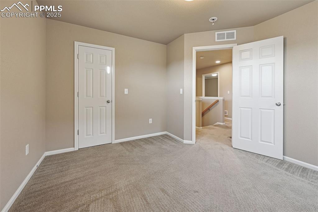 Image 23 of 36: Bedroom