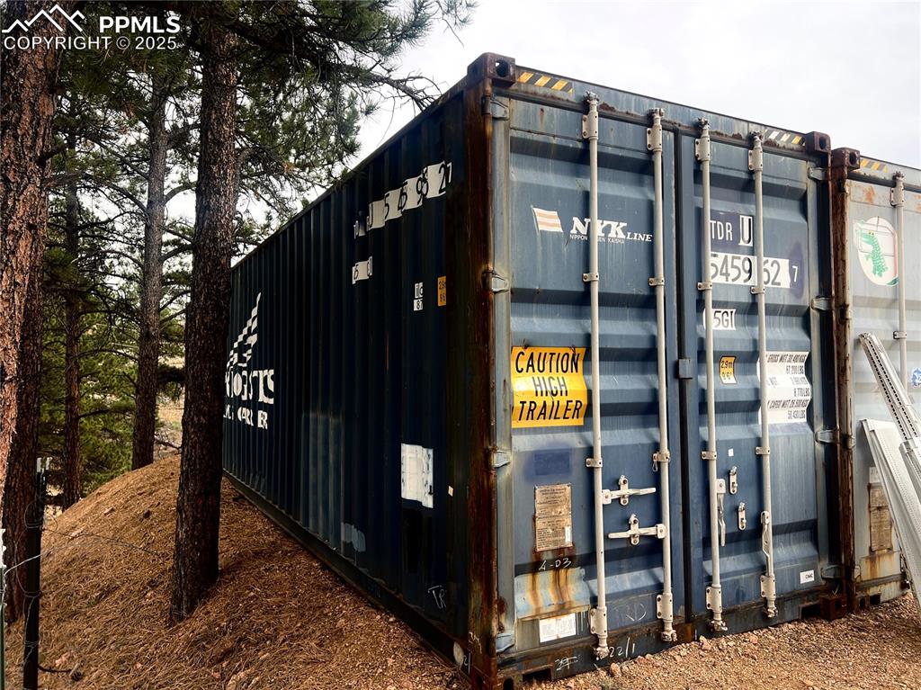 Image 50 of 50: 4 Conex boxes