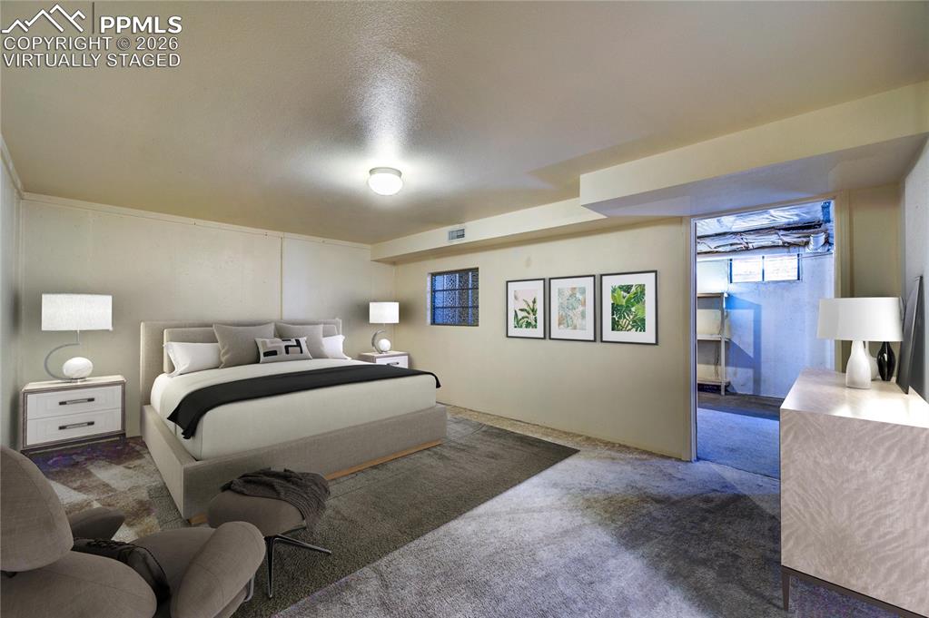 Image 32 of 40: Virtually staged - non-conforming bedroom