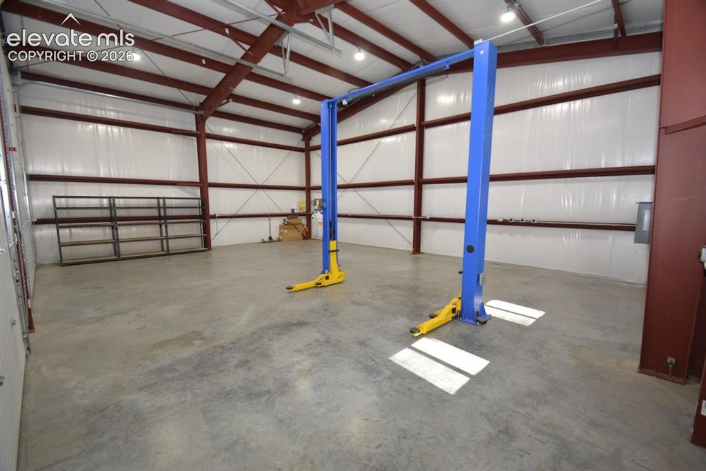 Image 35 of 48: HUGE! 1200sqft garage with 14x14 doors