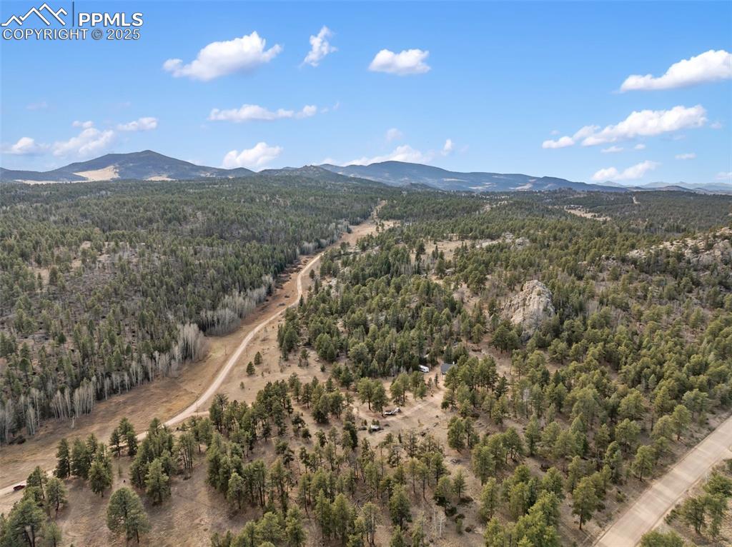 Image 13 of 30: Drone / aerial view of a mountainous background