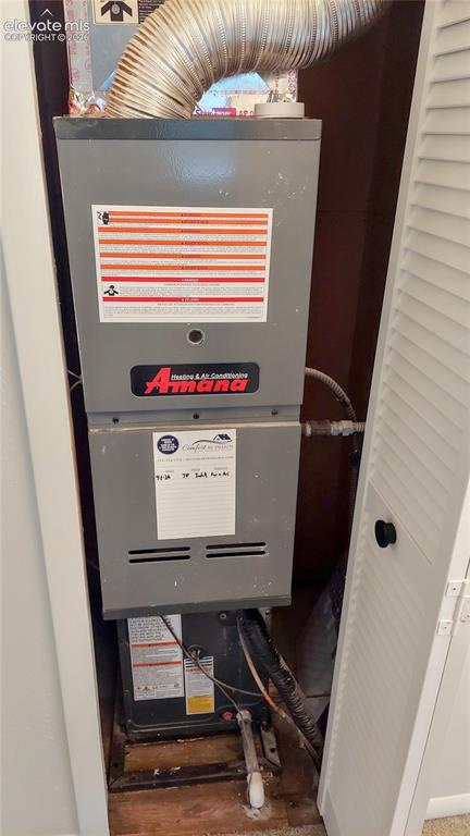 Image 22 of 22: Brand new Amana furnace and air conditioning unit installed.