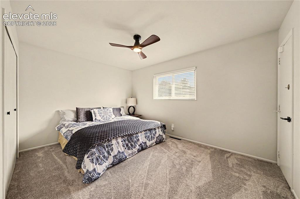 Image 9 of 18: Primary Bedroom easily accomodates a King Bed and has two Closets. New Carp