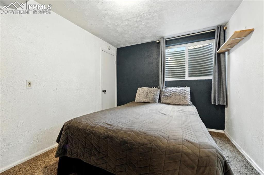 Image 31 of 43: Basement carpeted Bedroom #4