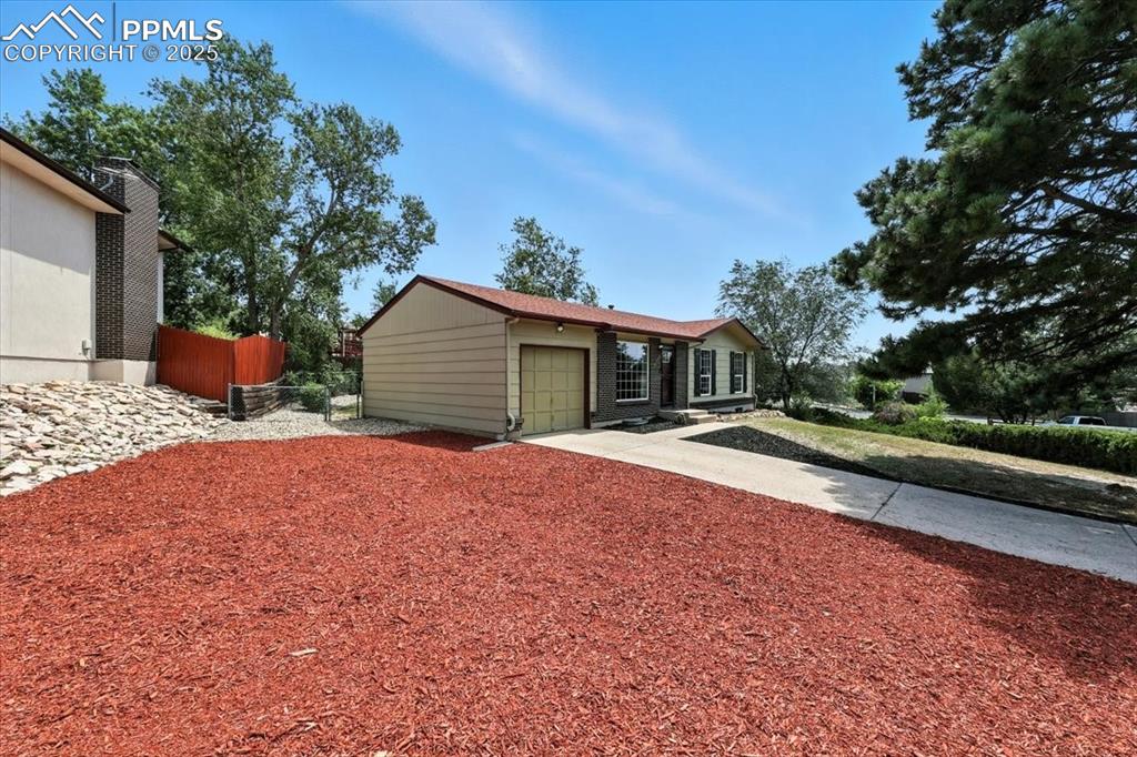 Image 40 of 43: Sideview of yard with room for RV parking