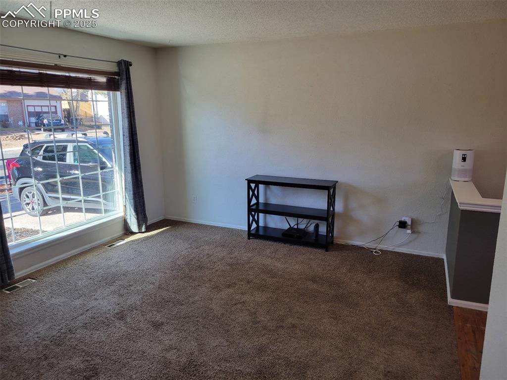 Image 5 of 43: Living Room with Large Picture Window for Natural Lighting