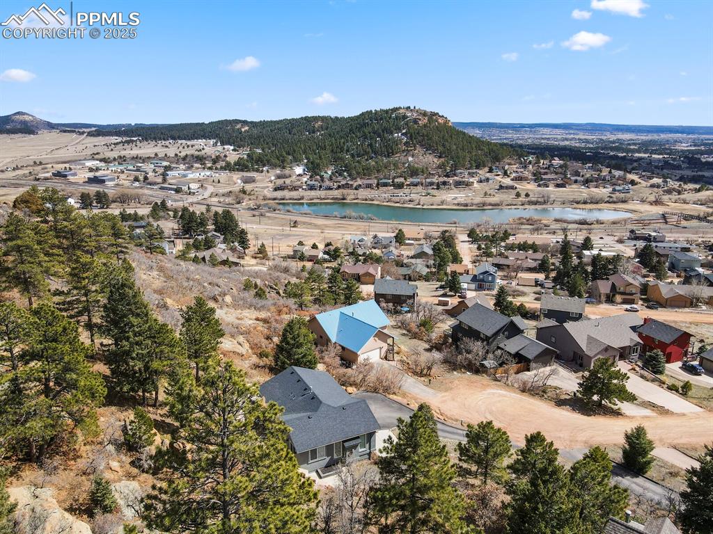 Image 38 of 41: Aerial view featuring a water view