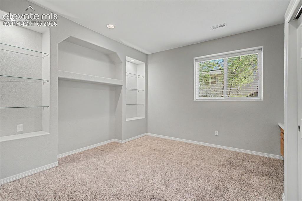 Image 44 of 50: Basement Bedroom