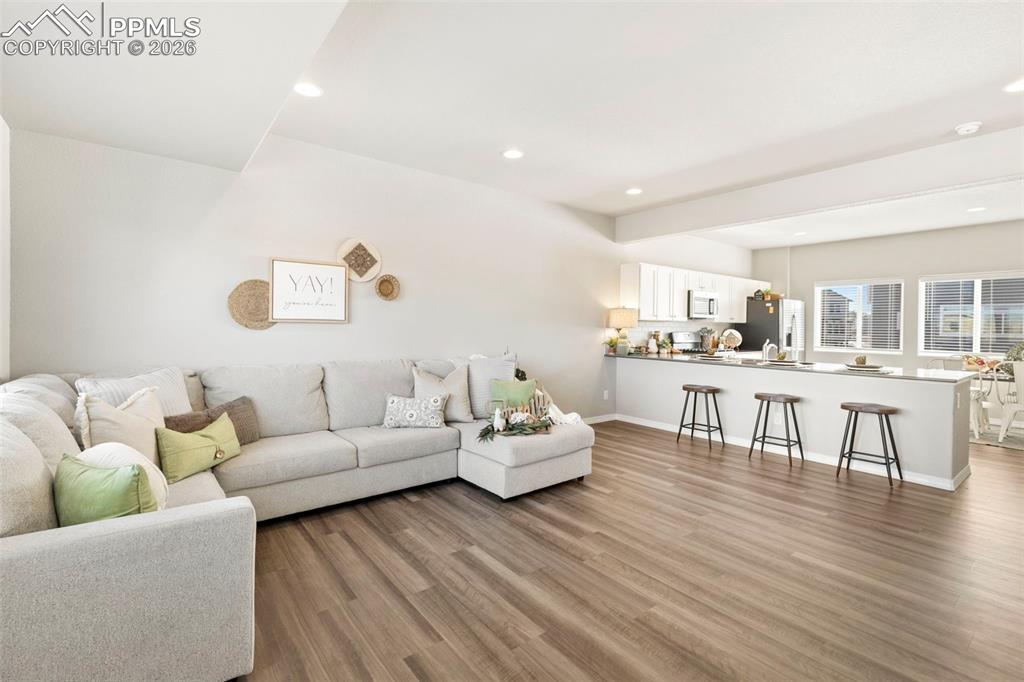 Image 10 of 35: Open to kitchen/dining.