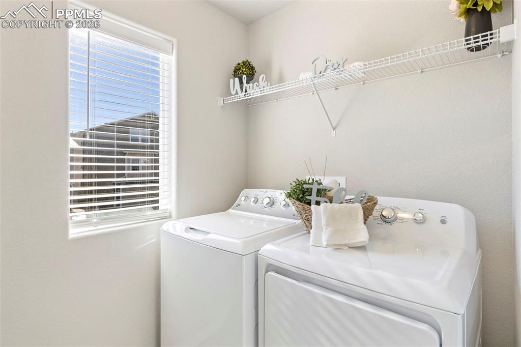 Image 22 of 35: Included washer and dryer.