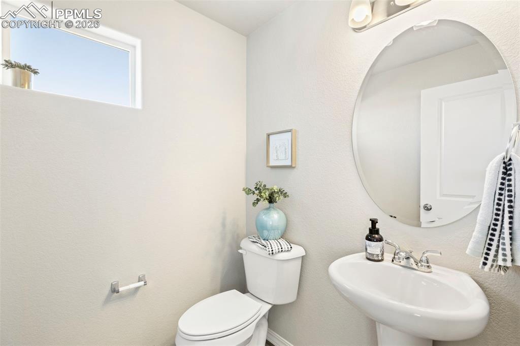 Image 23 of 35: Main floor powder room