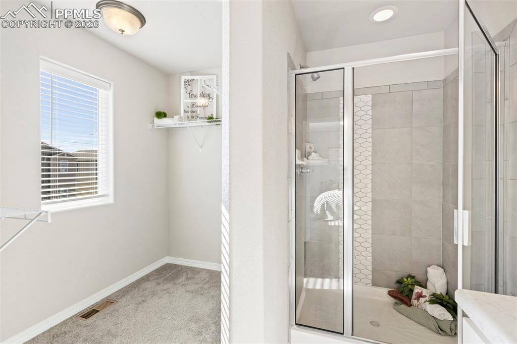 Image 29 of 35: Great closet with window.