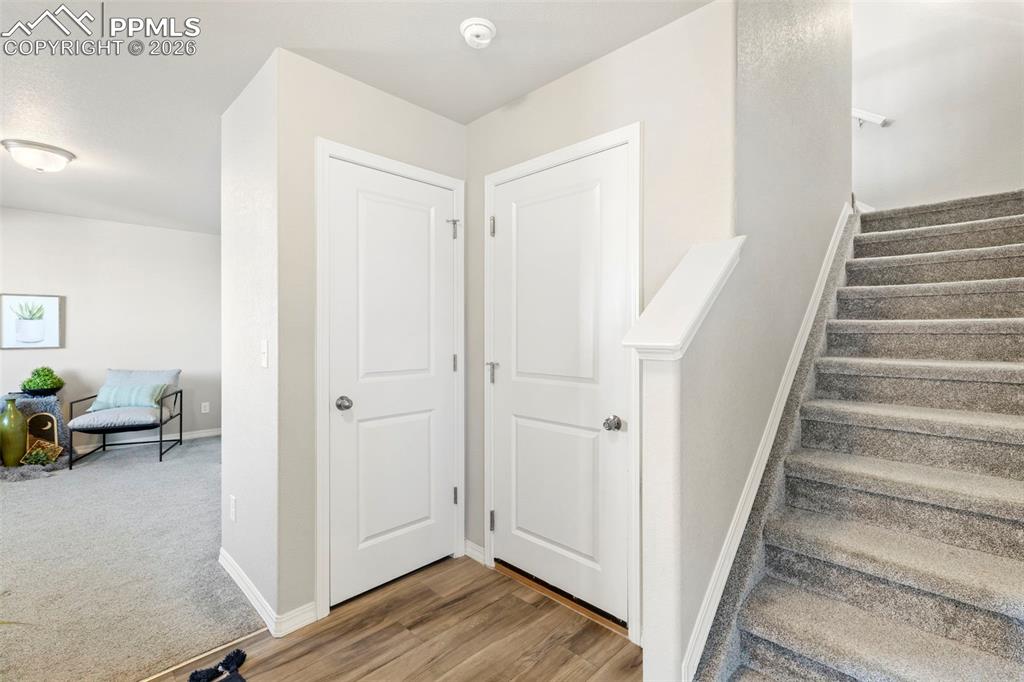 Image 4 of 35: Front entryway with hallway closet and flex room/office.