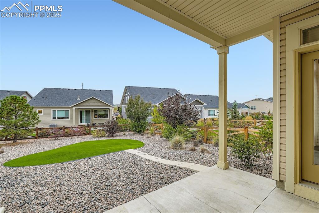 Image 23 of 28: View of yard with a residential view