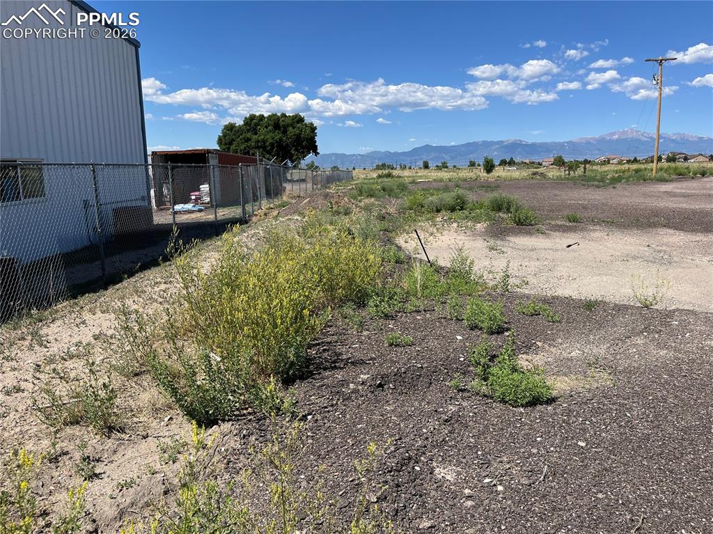 Image 14 of 20: View of yard with a mountain view