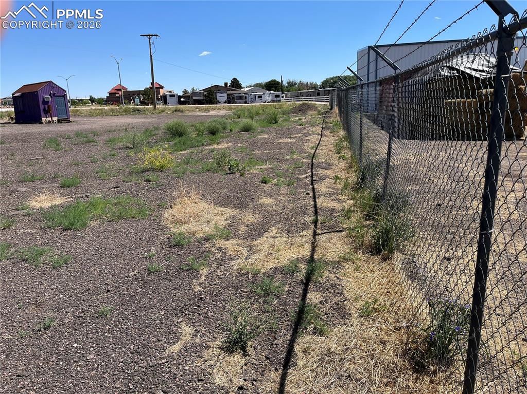 Image 15 of 20: View of yard with a storage shed