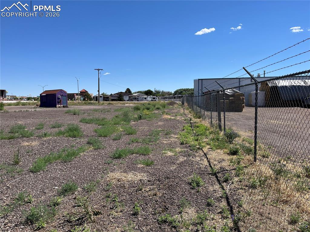 Image 17 of 20: View of yard featuring a shed