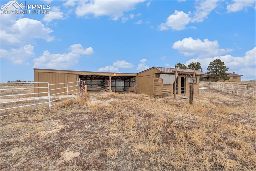 Image 28 of 34: View of outdoor structure with an exterior structure and a view of countrys