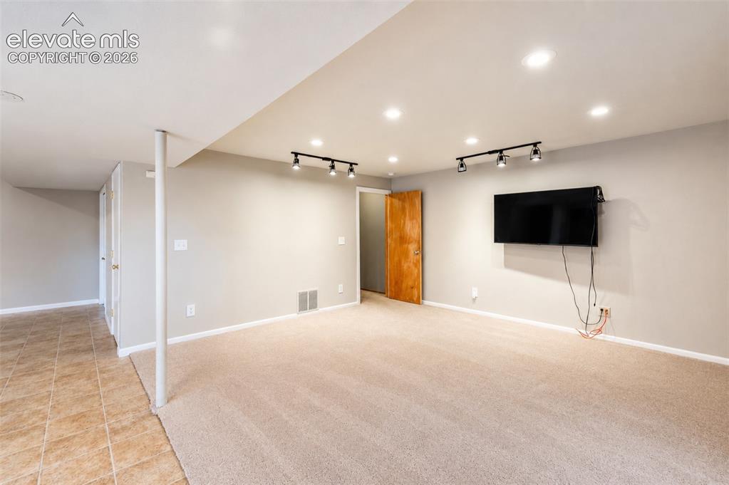 Image 25 of 43: Second living room - basement