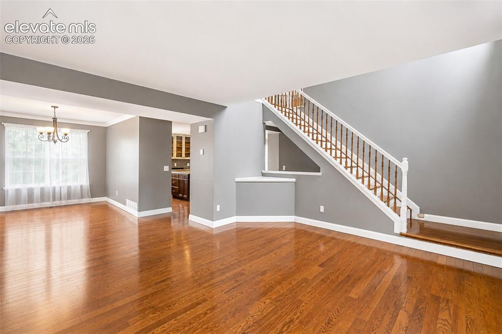 Image 3 of 43: Entry/family room/dining room - main floor