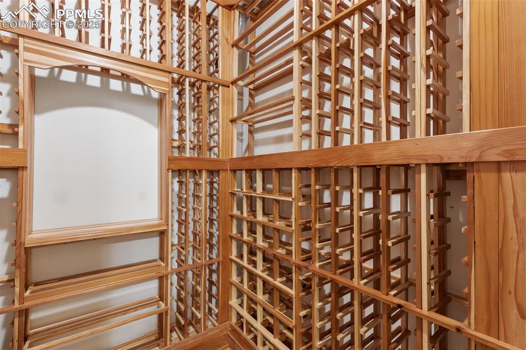 Image 39 of 48: Wine storage in basement bedroom closet