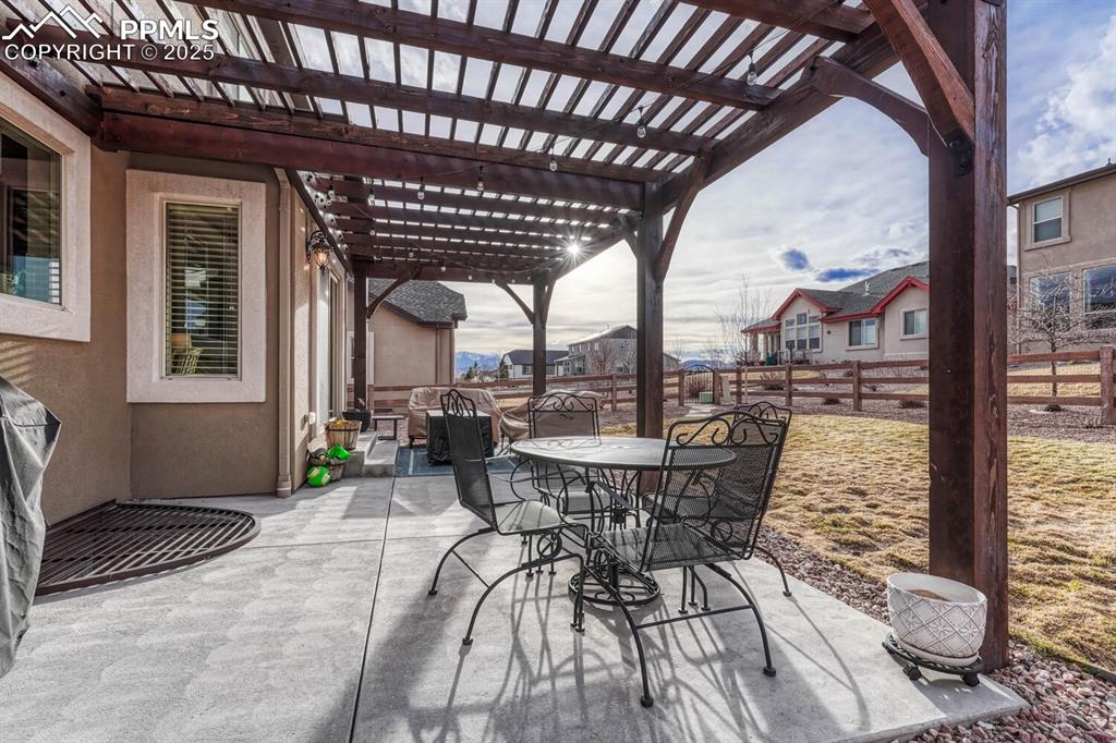 Image 44 of 49: View of patio / terrace featuring a fenced backyard, a pergola, and outdoor