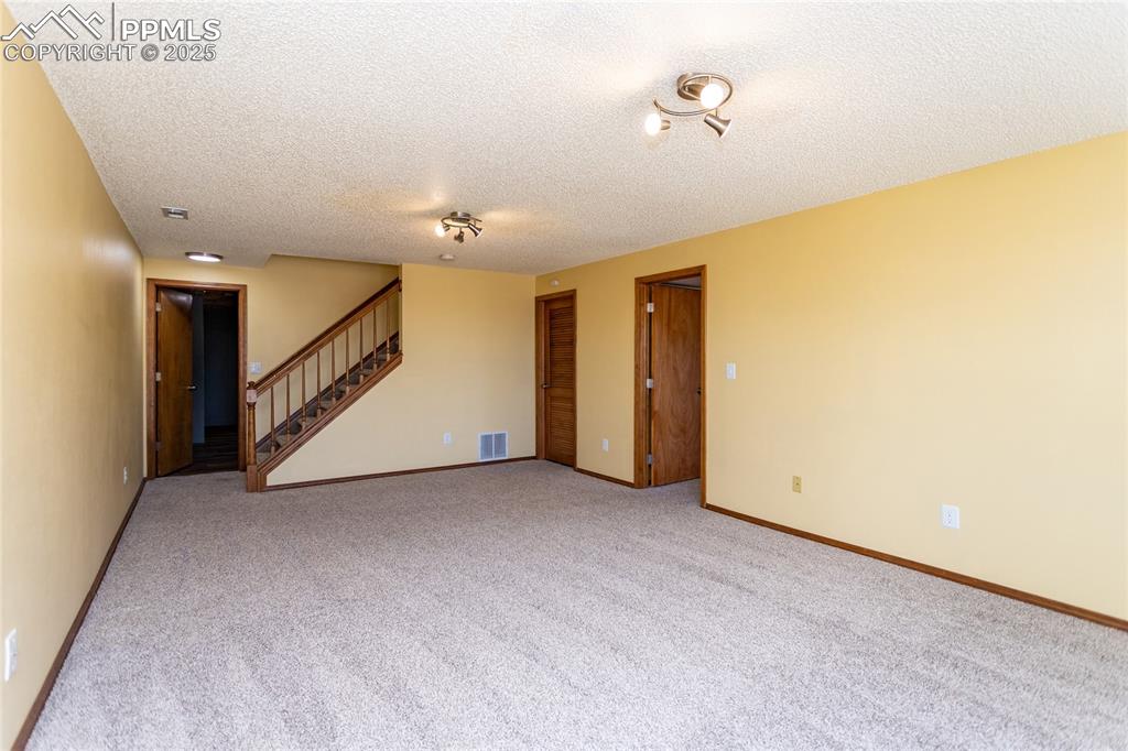 Image 35 of 48: Living area in walk out basement