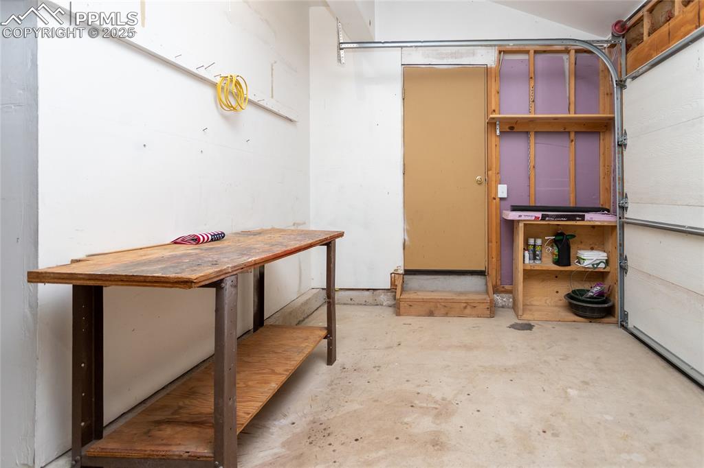 Image 44 of 48: Ample storage in oversized two-car garage
