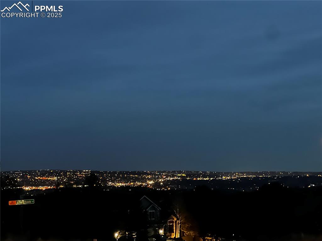 Image 46 of 48: Evening view of Colorado Springs from front porch
