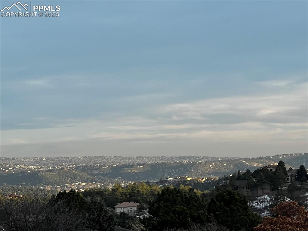 Image 47 of 48: Daytime view of Colorado Springs from front porch