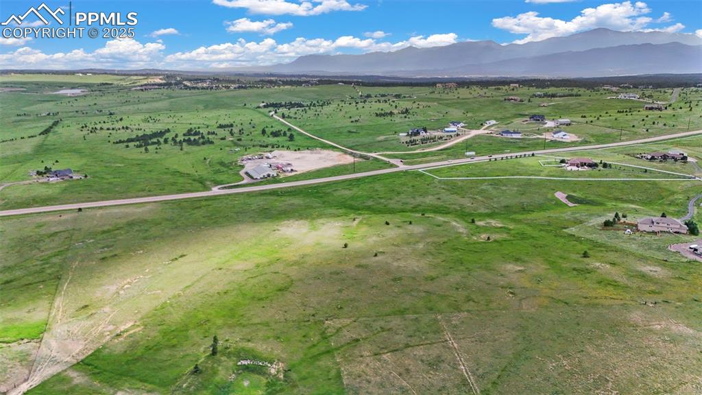 Image 17 of 23: Overview of land with mountain backdrop