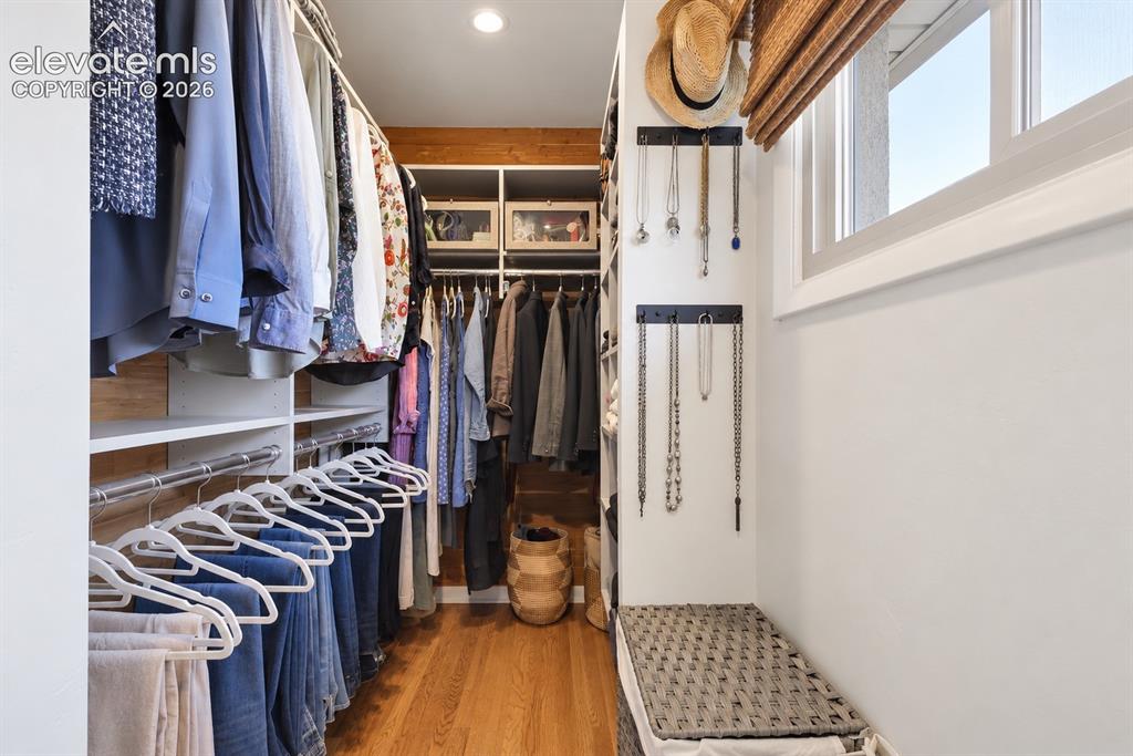 Image 18 of 36: Primary bedroom walk in closet
