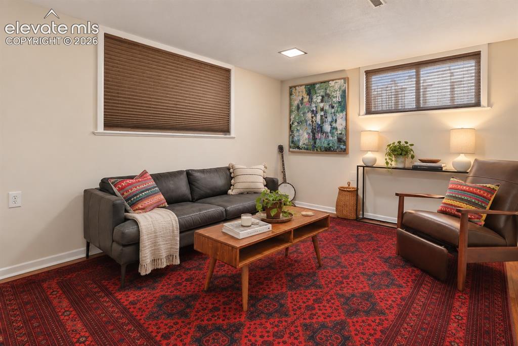 Image 26 of 36: Flexible lower-level space perfect for a second living area, guest room, ho