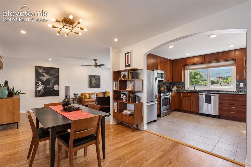 Image 8 of 36: Beautifully appointed with walnut soft-close cabinetry, built-in pantry, gr