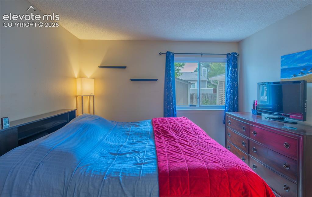 Image 14 of 42: Main floor Primary bedroom