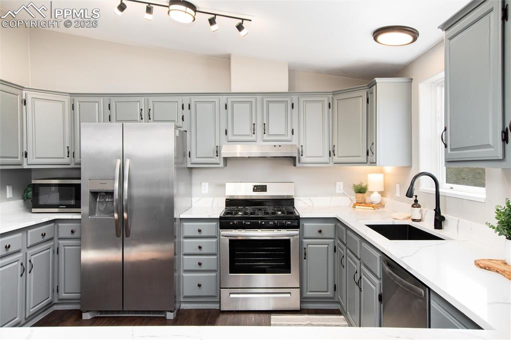 Image 15 of 50: Beautiful natural light comes through the dining room!