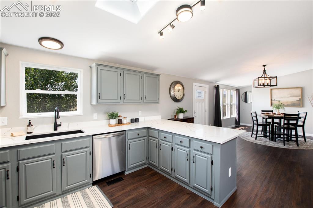 Image 17 of 50: Dining opens into kitchen and living room!