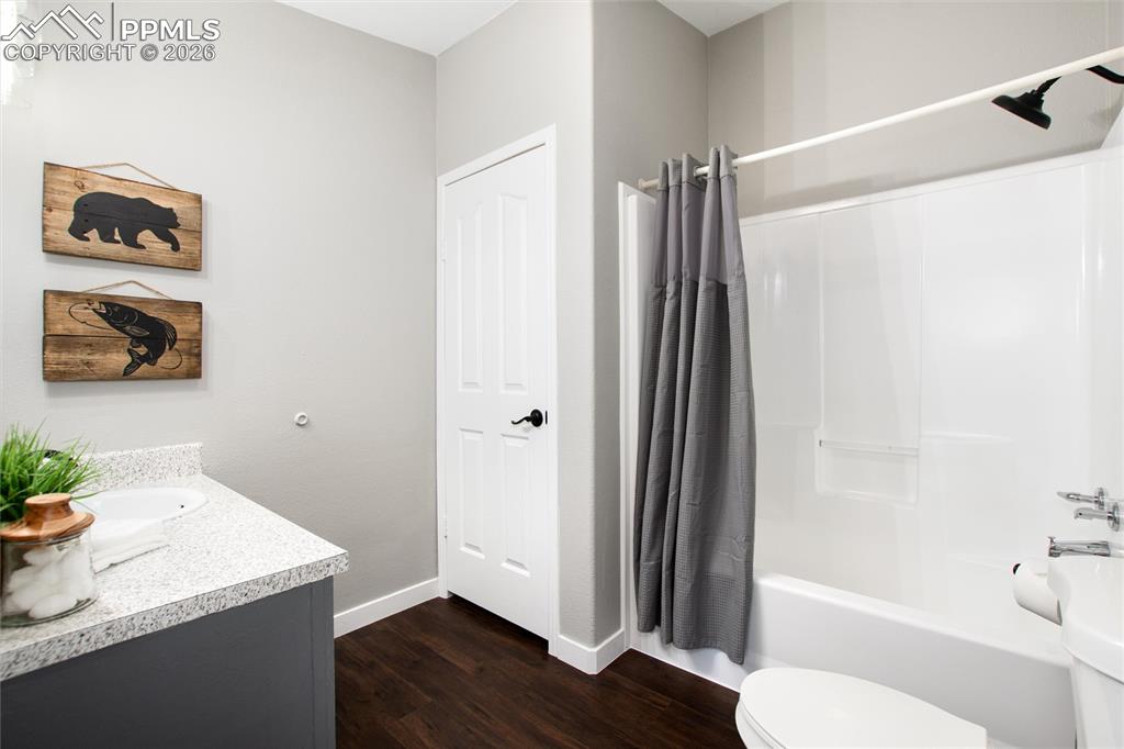 Image 31 of 50: Remodeled primary bathroom with double vanities