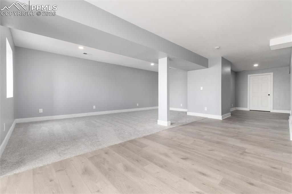 Image 33 of 50: Spacious shower in primary bath!