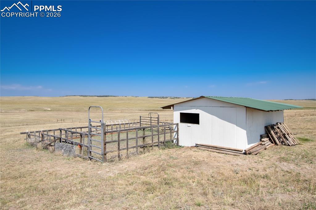 Image 40 of 50: Basement walkout - perfect spot for wet bar or kitchenette