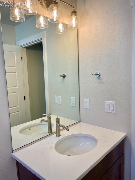 Image 10 of 28: Main level powder bath