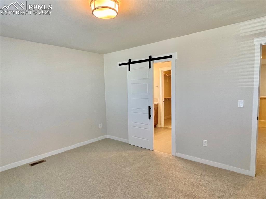 Image 11 of 28: Master Bedroom