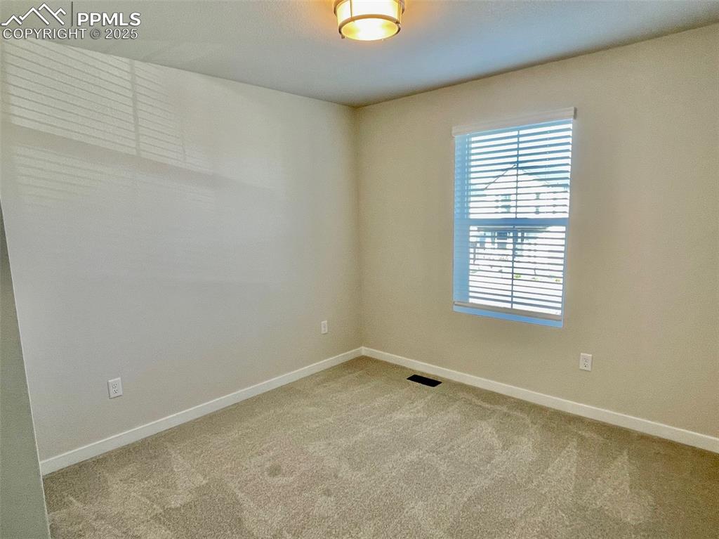 Image 18 of 28: Bedroom