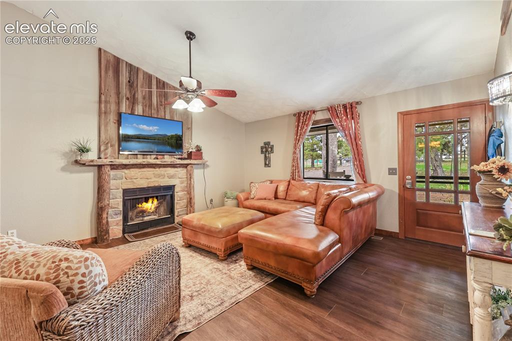 Image 12 of 50: Great room with fireplace!
