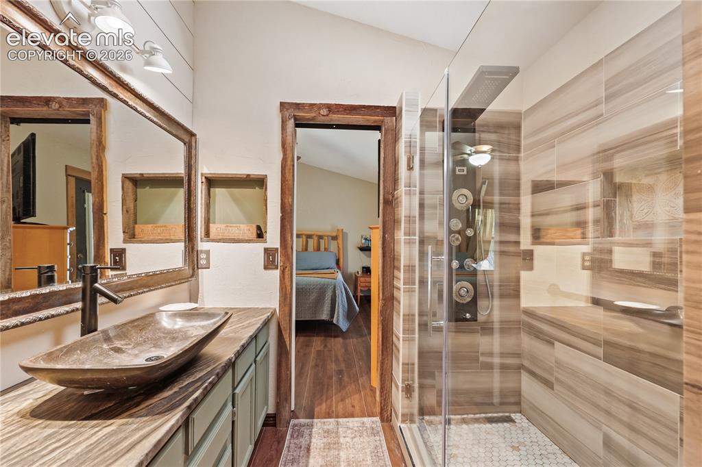 Image 17 of 50: Primary bathroom. Walk in shower!