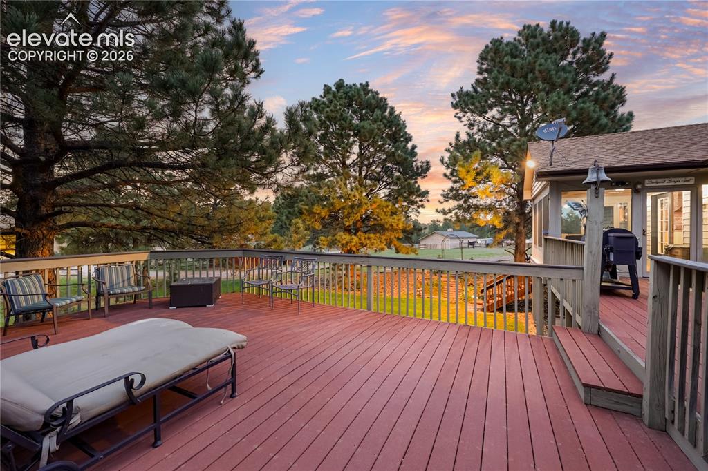 Image 30 of 50: Newer deck! Overlooking the horses!